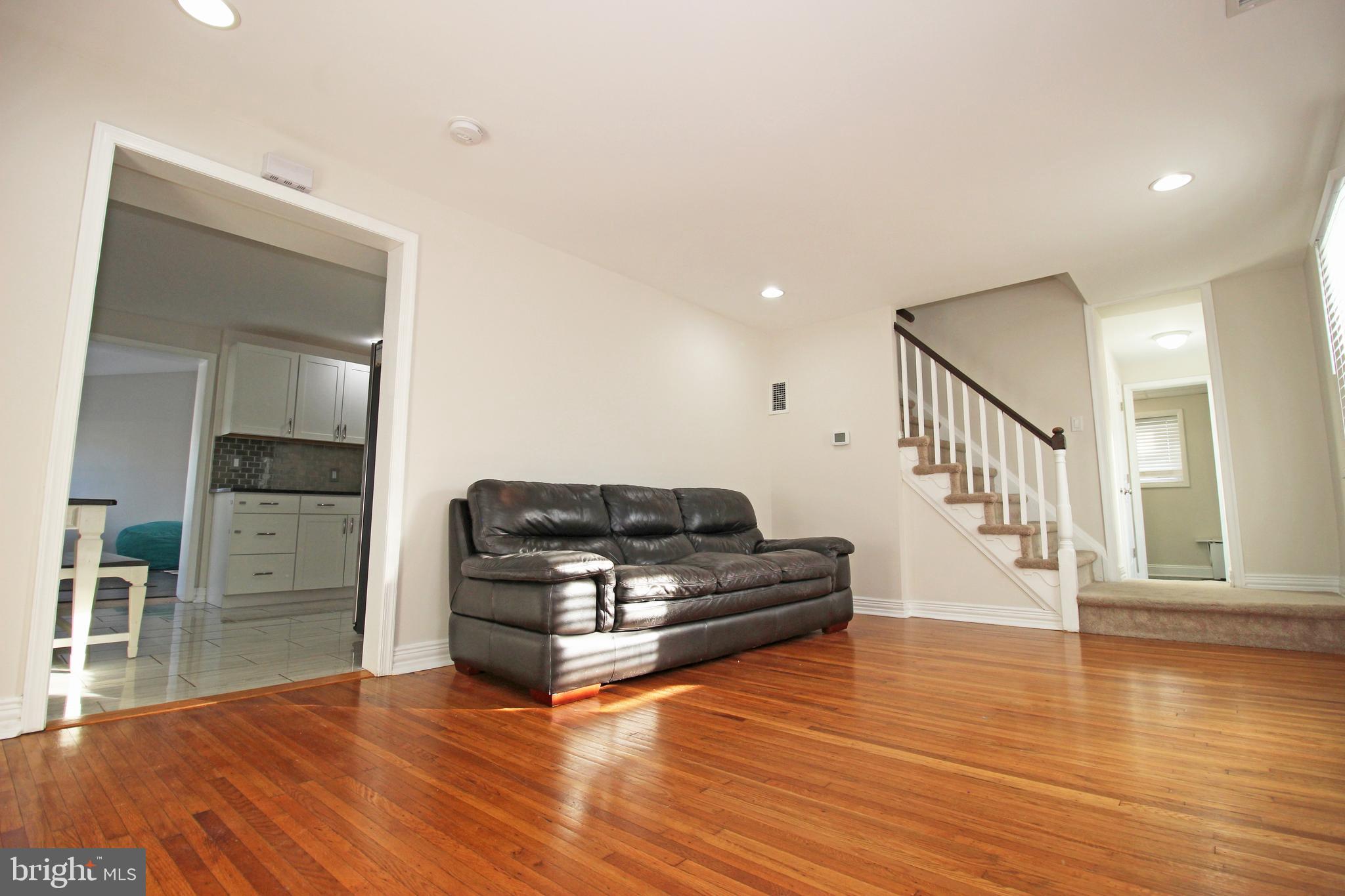 2748 Springhill Road Secane, PA 19018 - Photo 31 of 90 a living room with furniture and a wooden floor