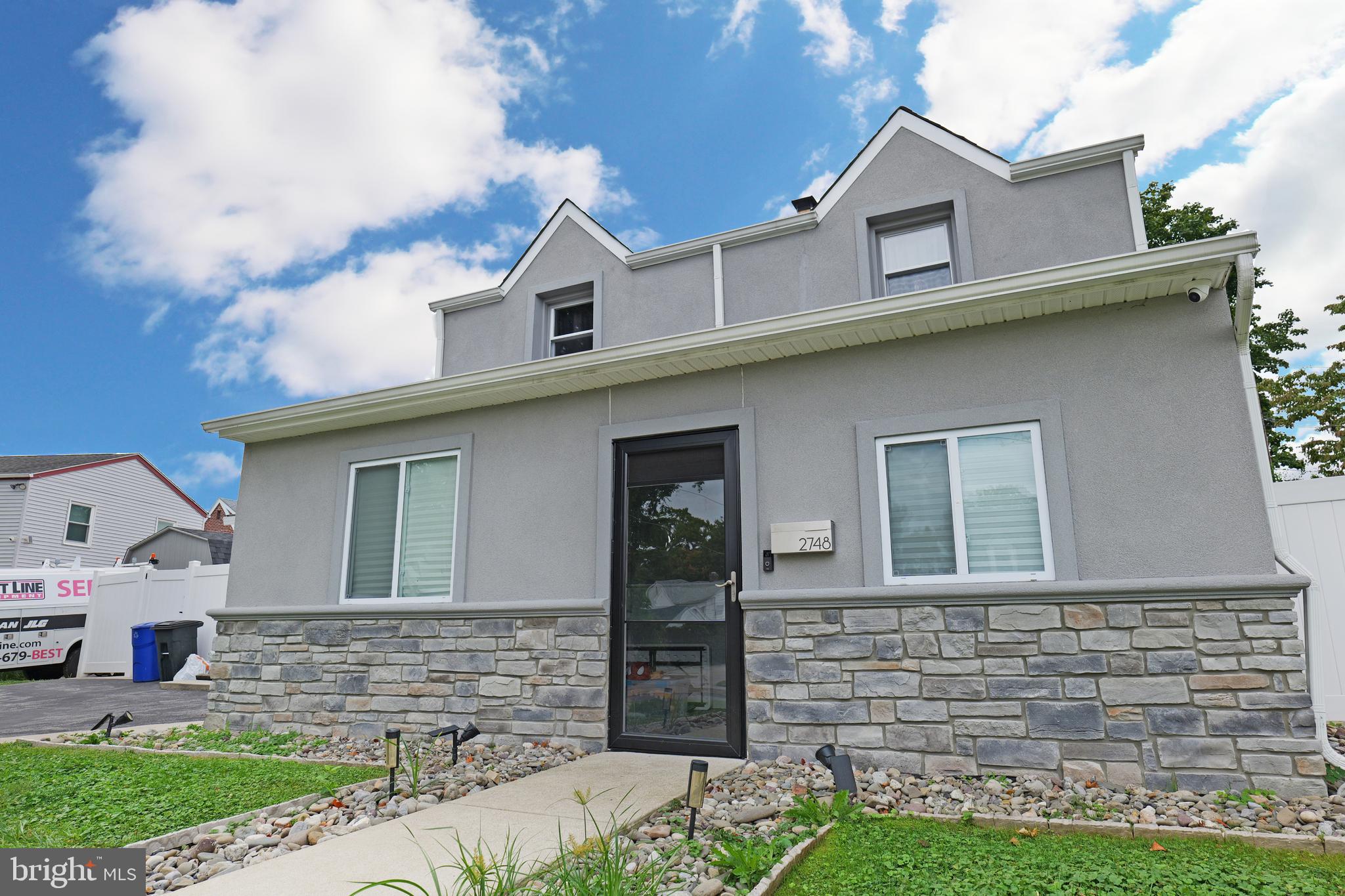 2748 Springhill Road Secane, PA 19018 - Photo 67 of 90 a front view of a house with garden