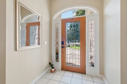 a view of an entryway with a door