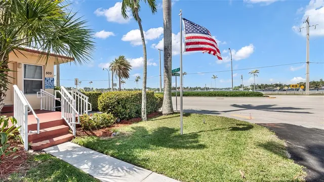 a view of a swimming pool with a lounge chairs