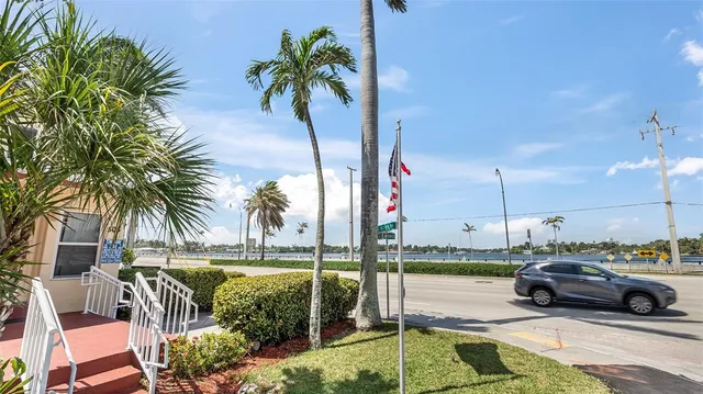 a view of outdoor space with swimming pool and furniture