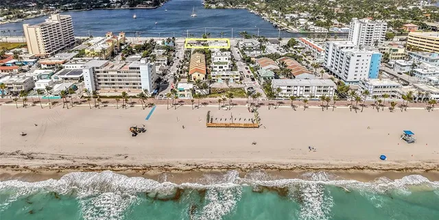 an aerial view of house with yard