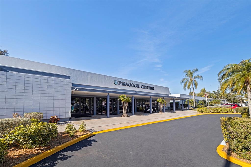 8221 112th Street North, Unit 203 Seminole, FL 33772 - Photo 28 of 31 a view of swimming pool with outdoor seating