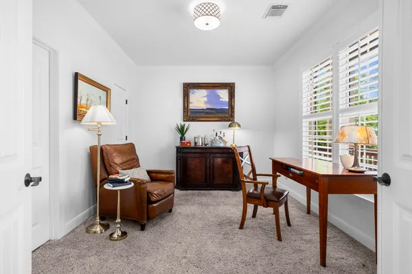 a room with furniture and a window