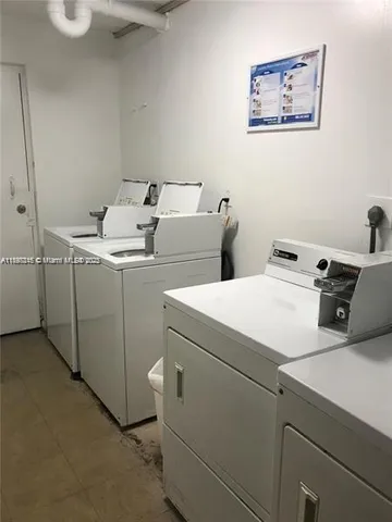 a picture of a building with a big yard