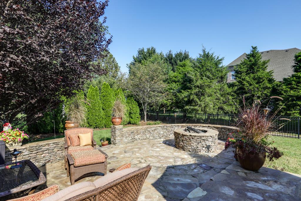 1216 White Rock Road Spring Hill, TN 37174 - Photo 22 of 25 Paving stone patio and fire pit in beautiful private yard