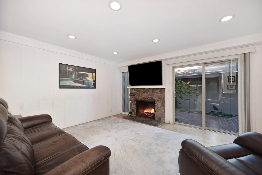 6902 Monticello Court Citrus Heights, CA 95621 - Photo 15 of 56 a living room with furniture and a fireplace