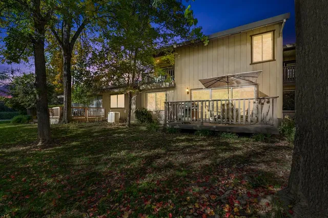 a dining room with furniture and outdoor view