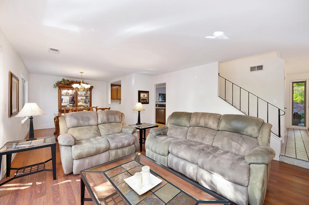 6902 Monticello Court Citrus Heights, CA 95621 - Photo 6 of 56 a living room with furniture and a wooden floor