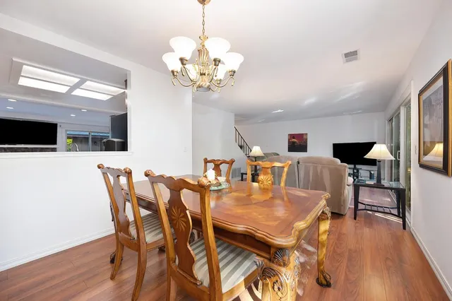 a kitchen with a sink stove and microwave