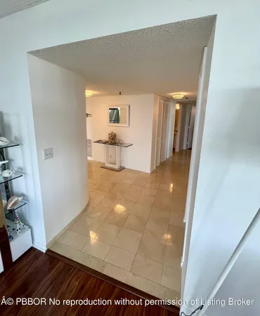 a view of a hallway view with staircase