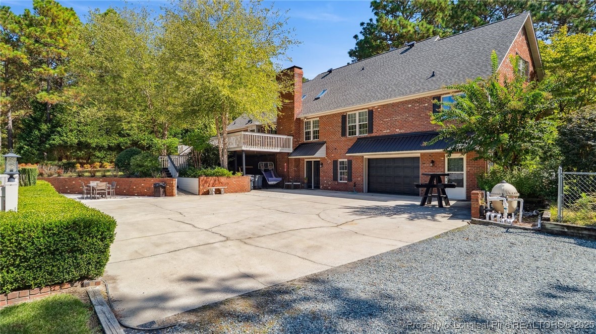 1336 McCaskill Road Carthage, NC 28327 - Photo 2 of 48 a view of a street with sitting area