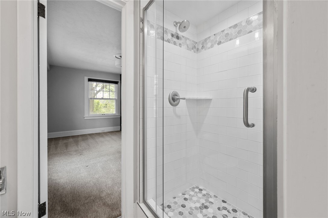 2924 Brighton Road Shaker Heights, OH 44120 - Photo 17 of 31 Bathroom featuring a shower stall and baseboards
