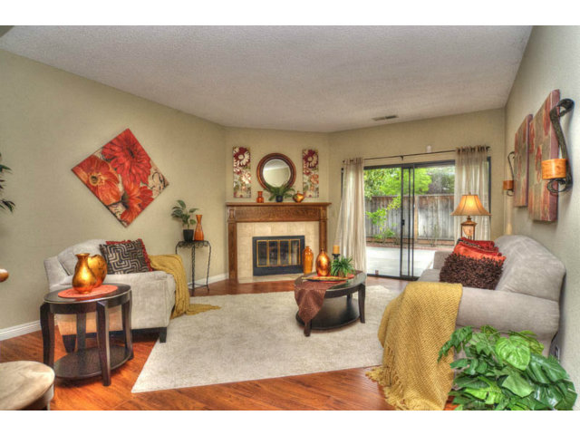 235 Michigan Road Milpitas, CA 95035 - Photo 2 of 24 a living room with furniture and a fireplace