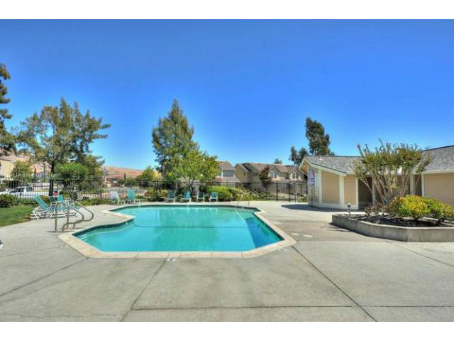 235 Michigan Road Milpitas, CA 95035 - Photo 24 of 24 a view of a swimming pool with a yard