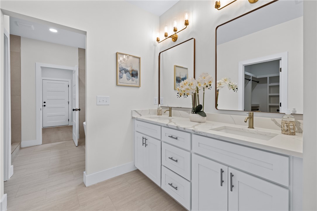 322 Oconee Avenue Westminster, SC 29693 - Photo 15 of 42 This spacious bathroom offers elegant finishes and abundant natural light.