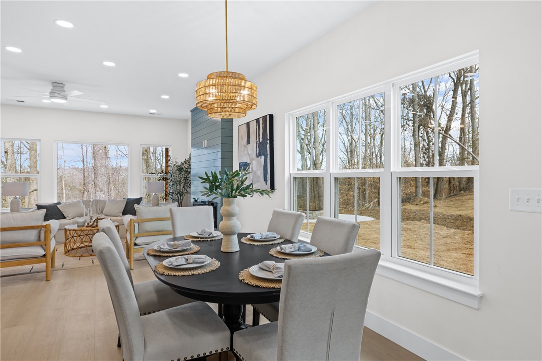 322 Oconee Avenue Westminster, SC 29693 - Photo 42 of 42 This bright dining area offers an open floorplan with views of the natural landscape.