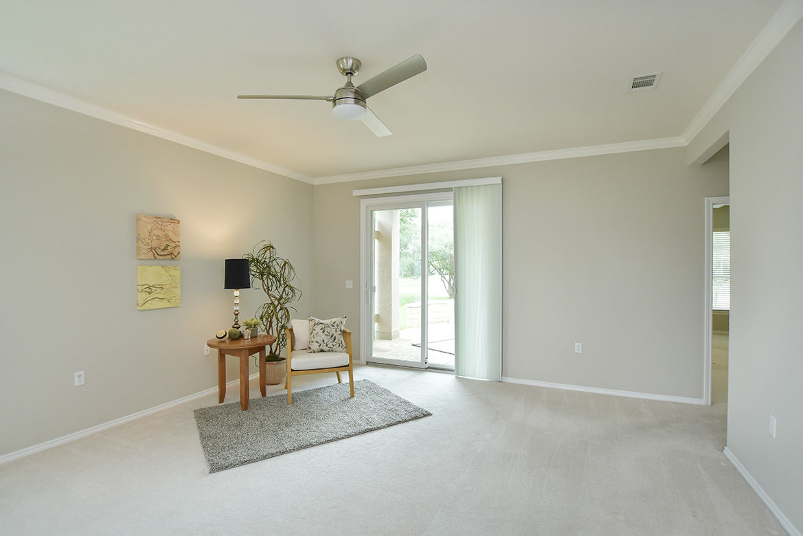 203 Winter Drive Georgetown, TX 78633 - Photo 11 of 29 An Andersen full-view sliding door is seen in the living area.