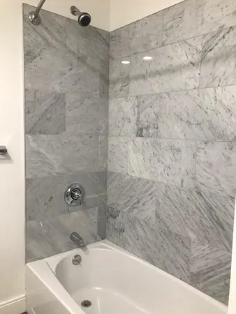 a bathroom with a bathtub