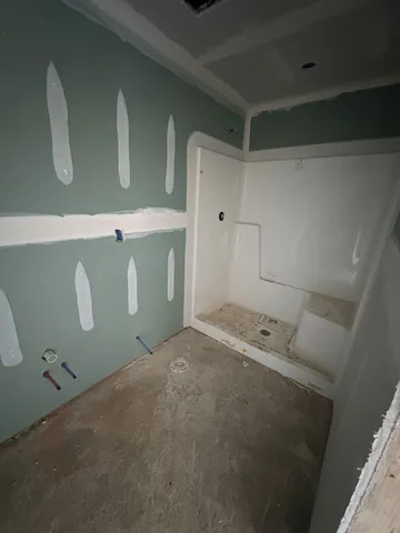 a utility room with cabinets