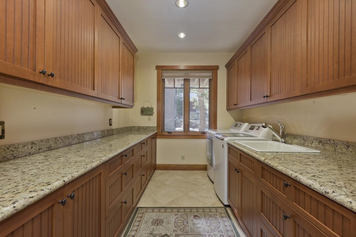 2500 Old Mammoth Road Mammoth Lakes, CA 93546 - Photo 38 of 48 a kitchen with a sink and cabinets