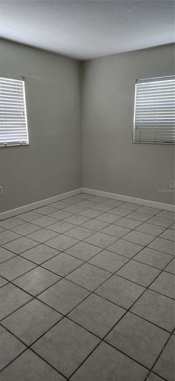 9829 Grace Drive Port Richey, FL 34668 - Photo 11 of 19 a view of room and window