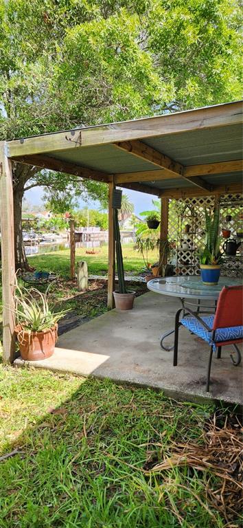 9829 Grace Drive Port Richey, FL 34668 - Photo 18 of 19 a view of outdoor space with seating
