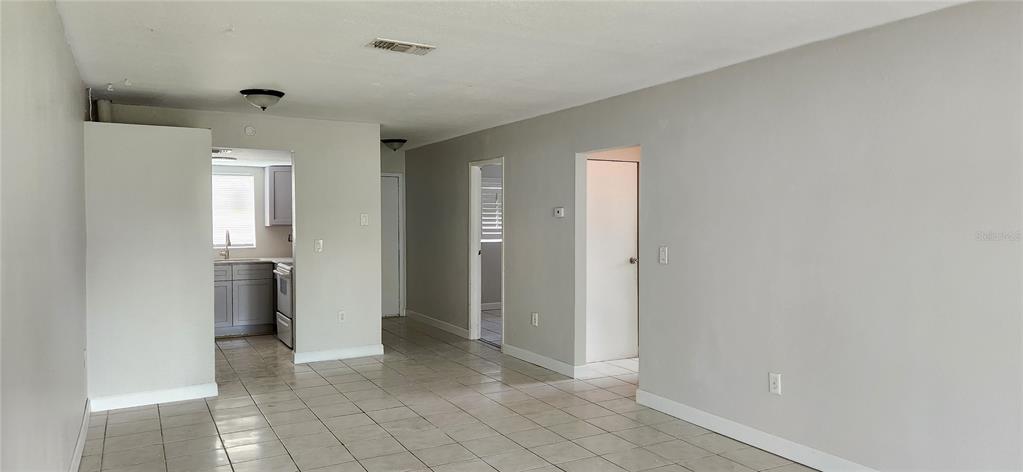 9829 Grace Drive Port Richey, FL 34668 - Photo 3 of 19 a view of a hallway