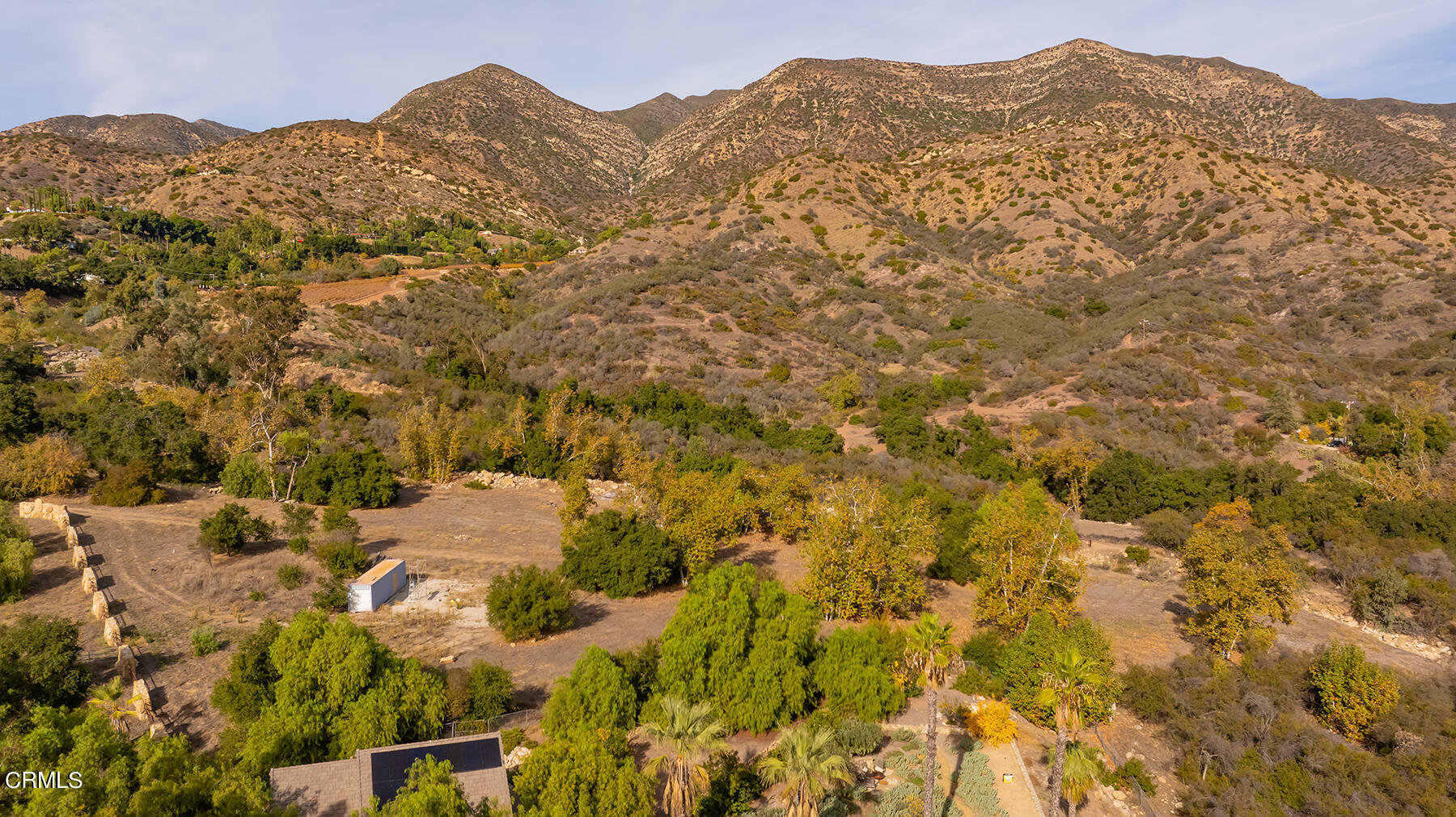 1218 Foothill Road Ojai, CA 93023 - Photo 1 of 30 a view of a mountain range in a cloudy sky
