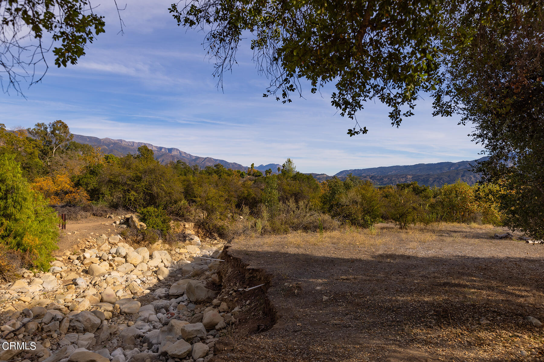1218 Foothill Road Ojai, CA 93023 - Photo 2 of 30 a view of a field with a tree in the background