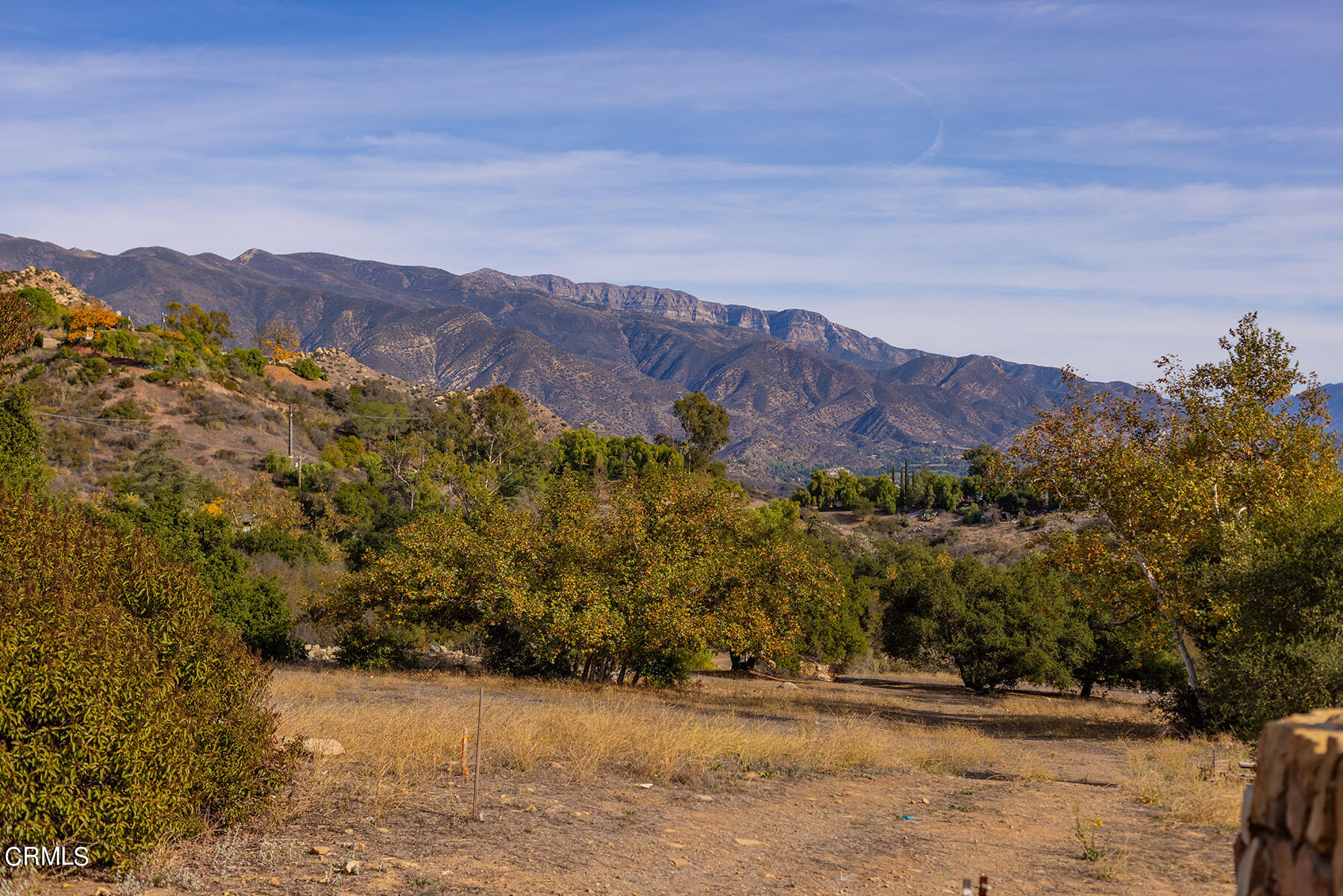 1218 Foothill Road Ojai, CA 93023 - Photo 10 of 30 a view of a lush green field with mountains in the background