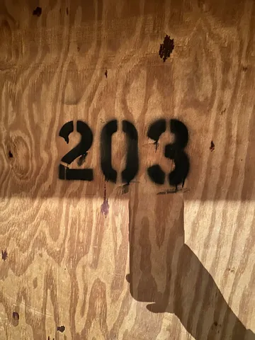 a view of balcony with wooden floor