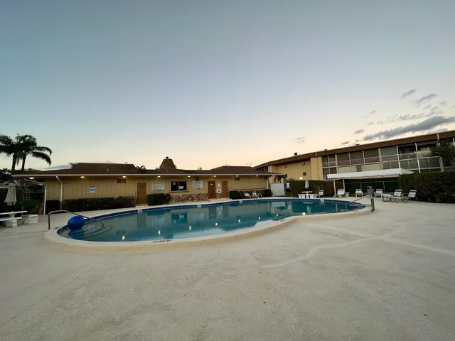 a view of houses with outdoor space and pool
