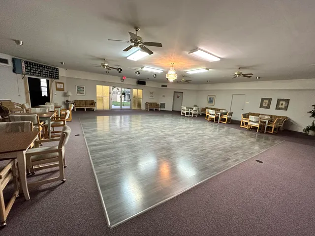 a room with furniture pool table and a table