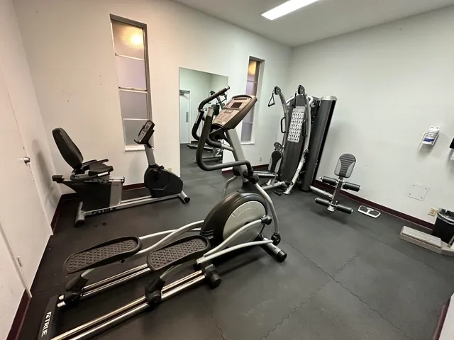 a view of a room with gym equipment