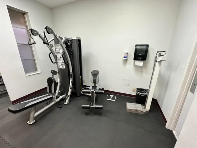 a view of wooden floor in a hall with wooden floor