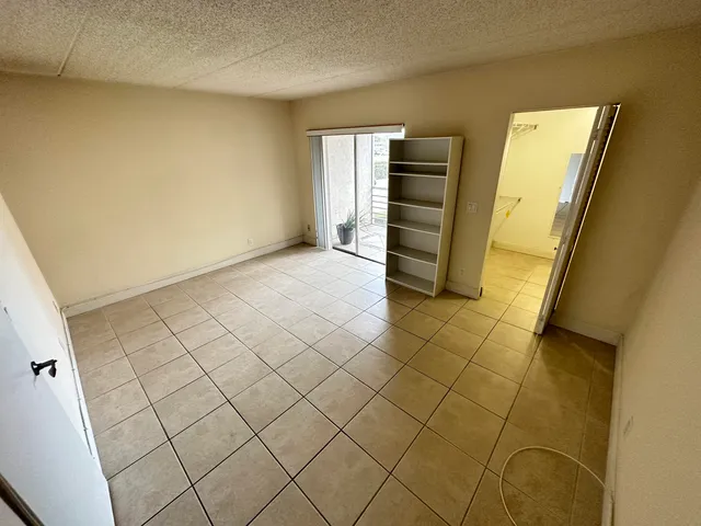 a view of walk in closet with window