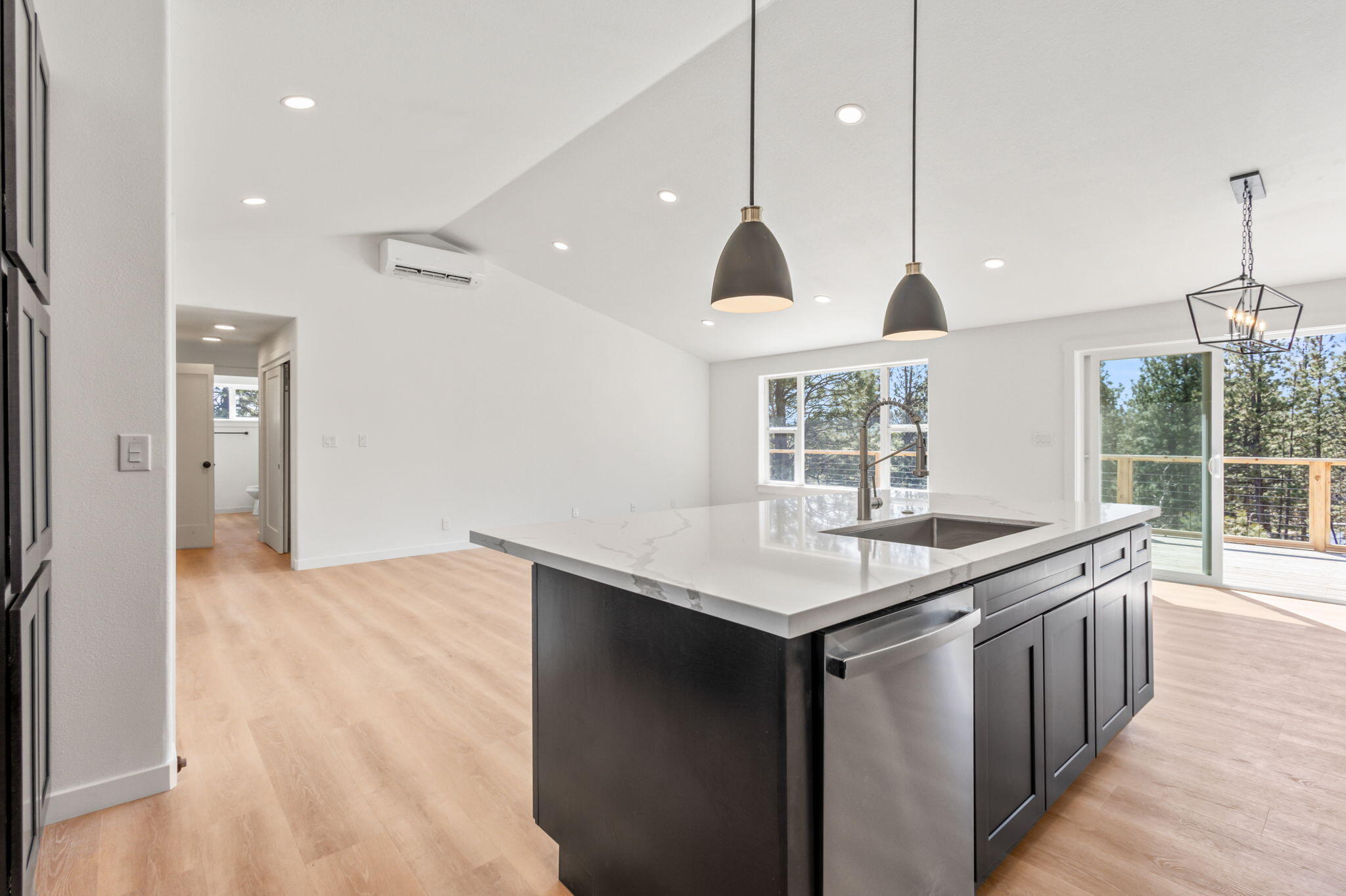 19126 Pumice Butte Road Bend, OR 97702 - Photo 12 of 40 a kitchen with a sink and window