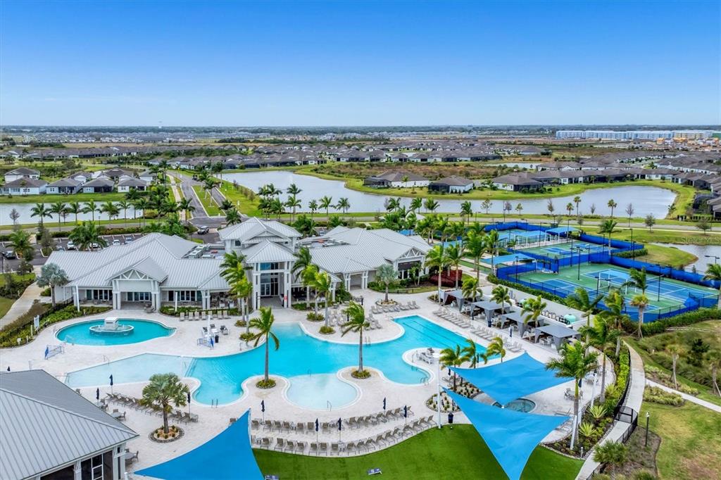 8705 Coastal Key Way Palmetto, FL 34221 - Photo 65 of 68 a view of a city with an swimming pool and outdoor seating