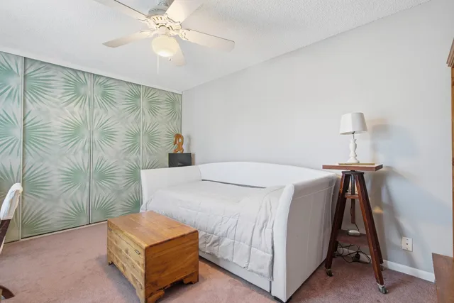 a view of a city with lush green forest