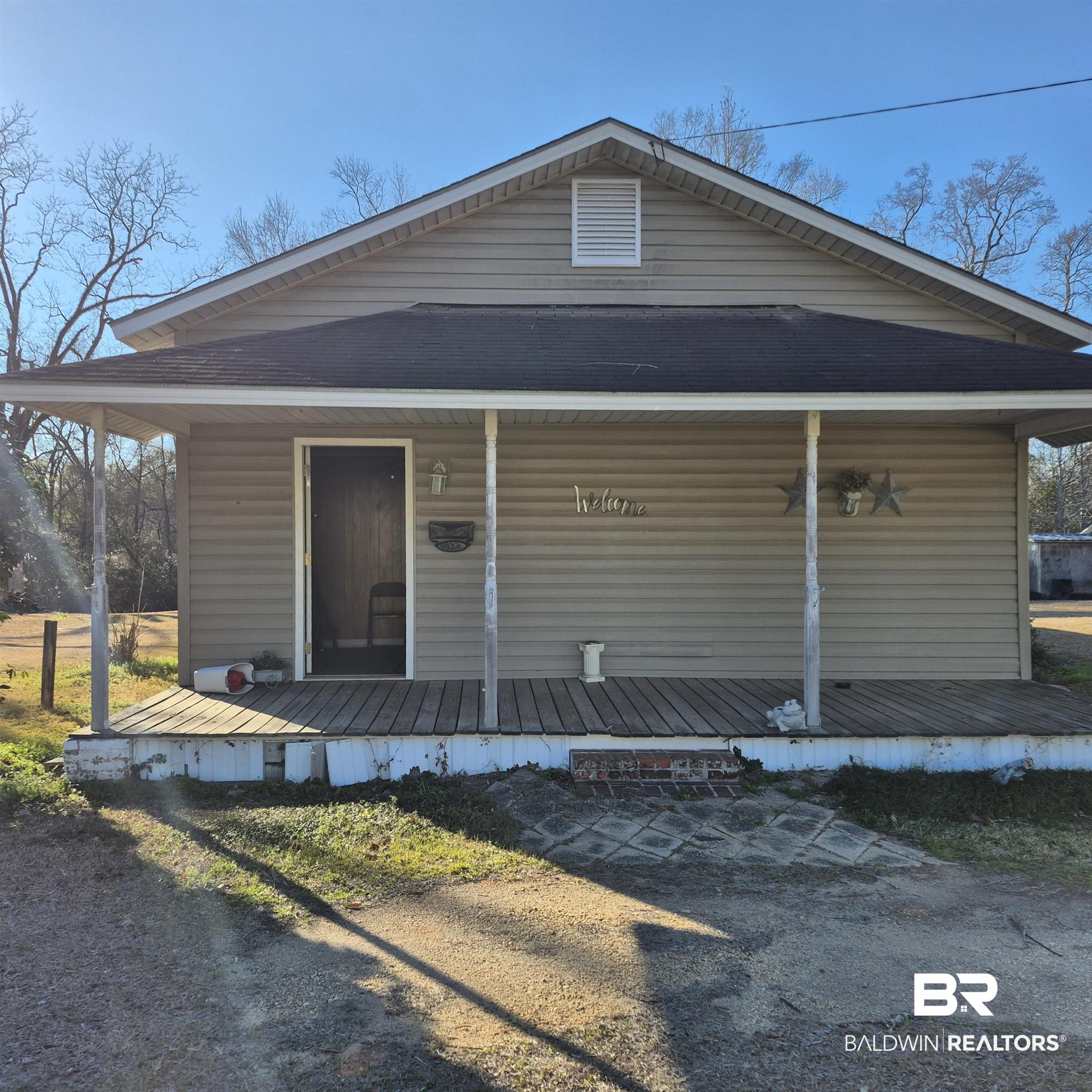 320 Bruner Avenue Evergreen, AL 36401 - Photo 1 of 15 View of front of home featuring covered porch