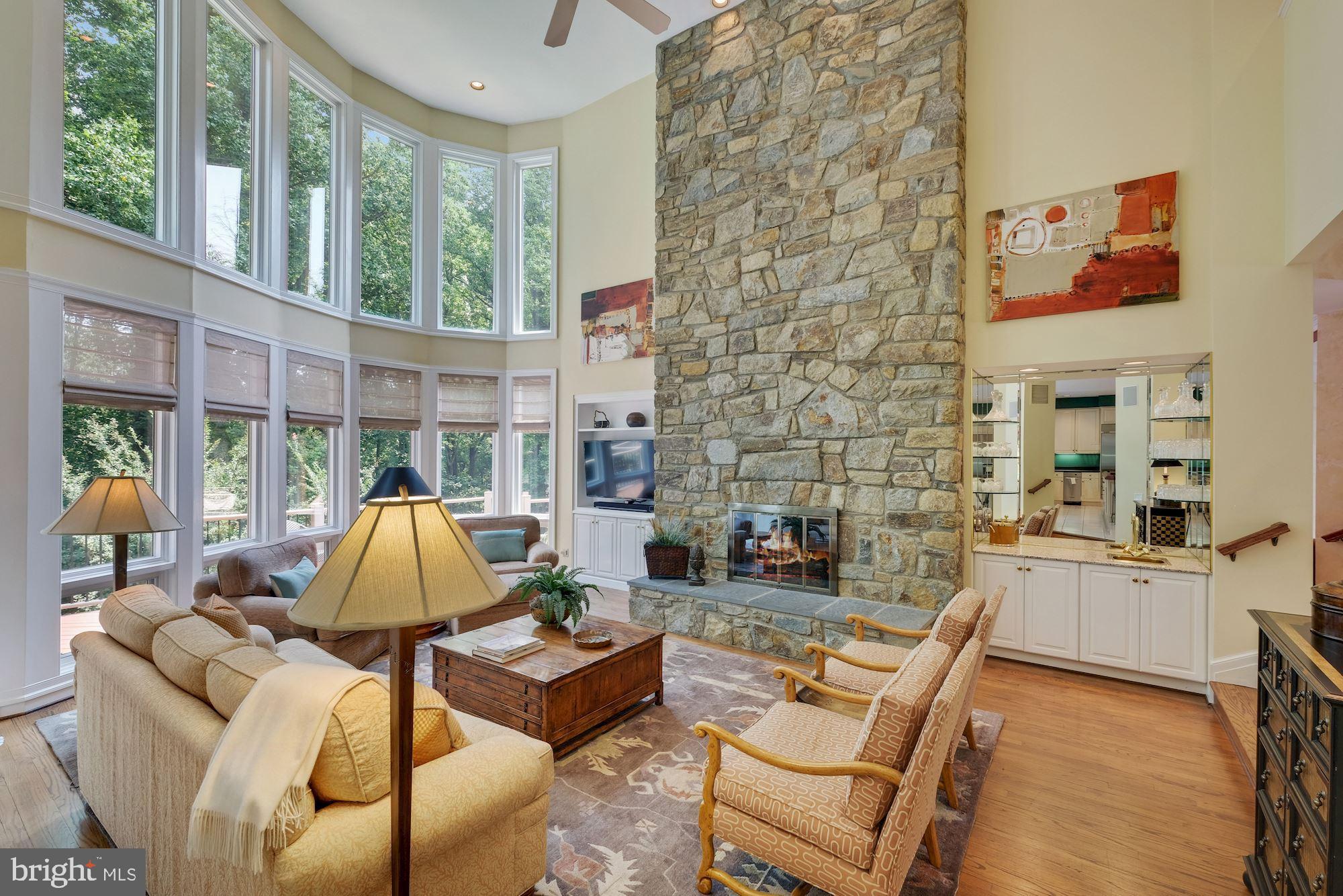 7017 Mountain Gate Drive Bethesda, MD 20817 - Photo 12 of 50 Family Room with Wall of Windows