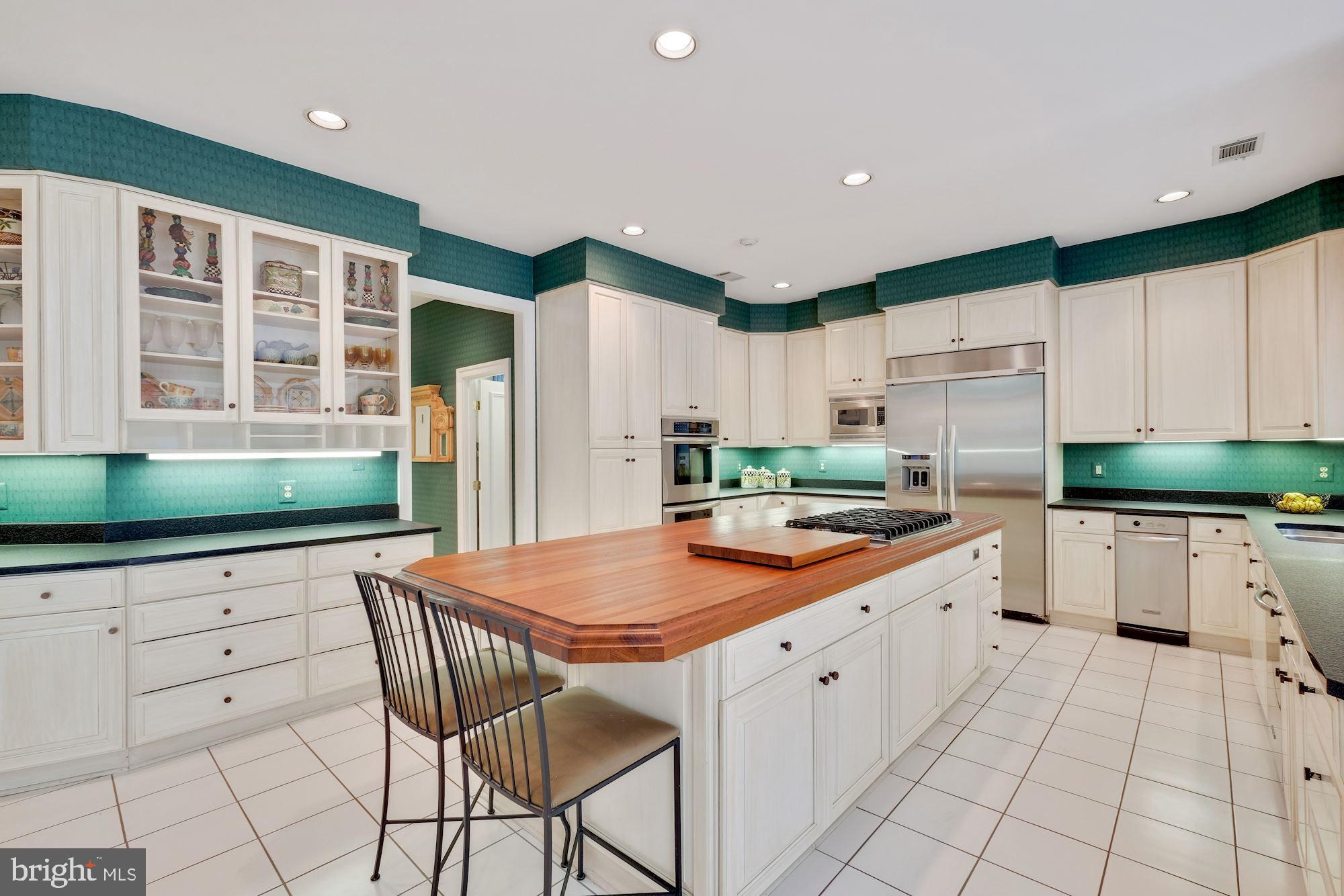7017 Mountain Gate Drive Bethesda, MD 20817 - Photo 15 of 50 Kitchen Island