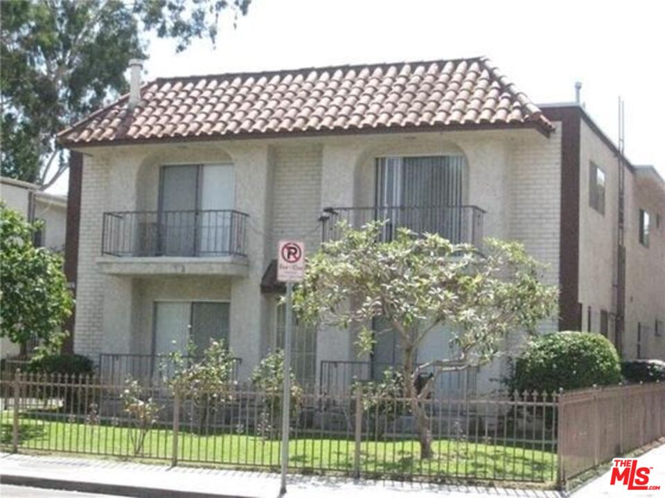 10836 Camarillo Street, Unit 3 North Hollywood, CA 91602 - Photo 2 of 12 a front view of a house with a garden