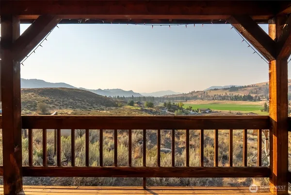 a view of a street from a balcony