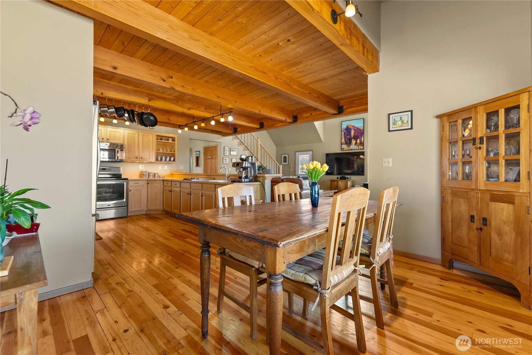 13 Serviceberry Road Winthrop, WA 98862 - Photo 13 of 40 a dining room with furniture and wooden floor