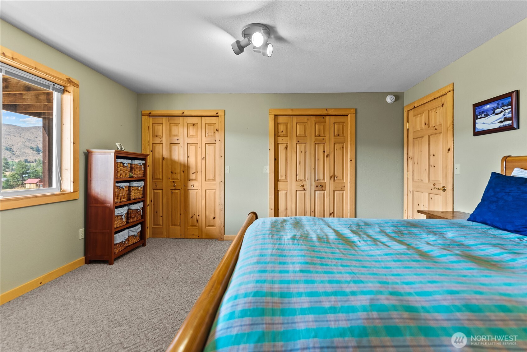 13 Serviceberry Road Winthrop, WA 98862 - Photo 34 of 40 a view of a bedroom with furniture and windows
