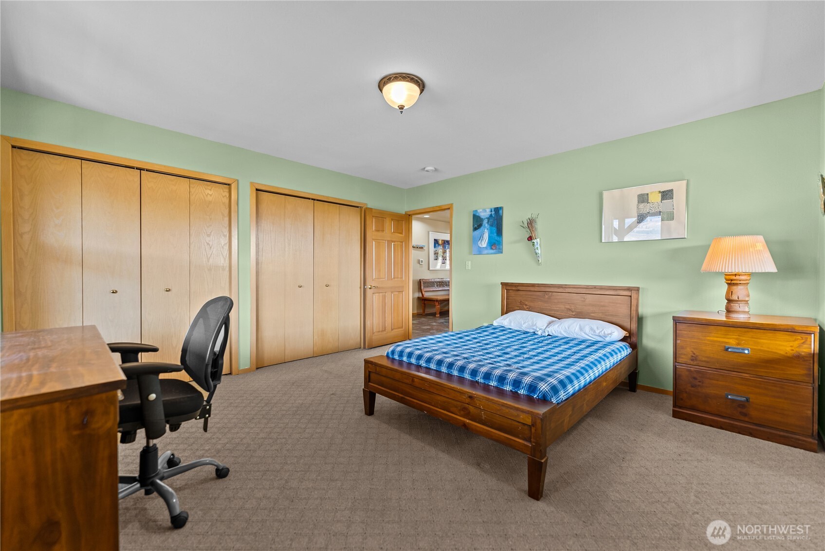 13 Serviceberry Road Winthrop, WA 98862 - Photo 35 of 40 a bedroom with a bed and a desk