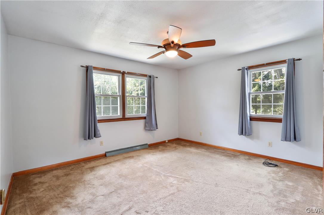 481 Henry Road Nazareth, PA 18064 - Photo 13 of 35 an empty room with windows and ceiling fan