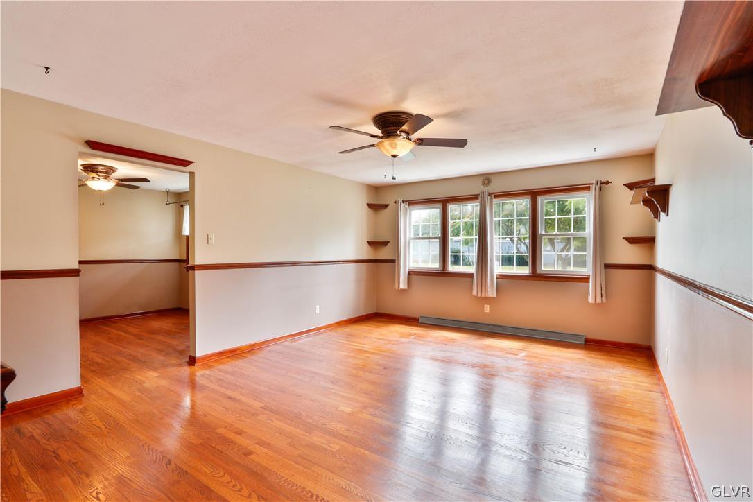 481 Henry Road Nazareth, PA 18064 - Photo 8 of 35 a view of an empty room with a window and wooden floor